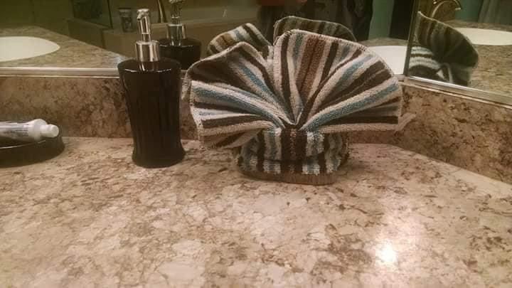 Decorative towel fold — the Greysy finishing touch