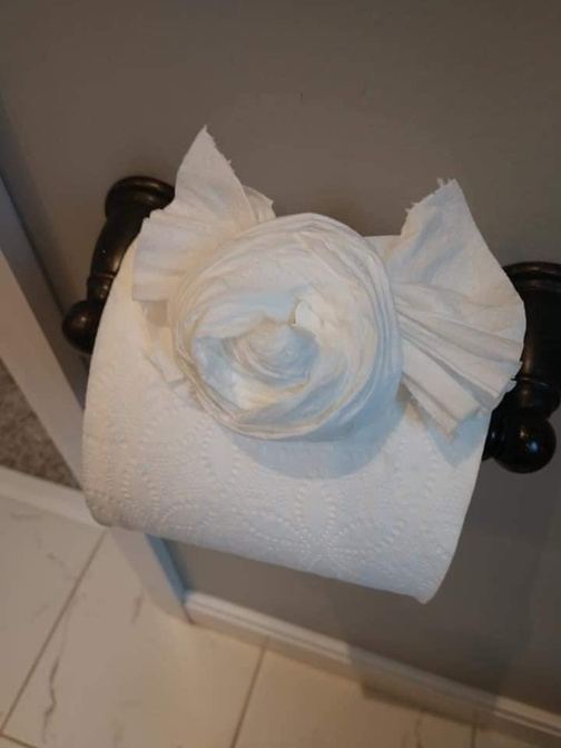 Toilet paper folded into a rose