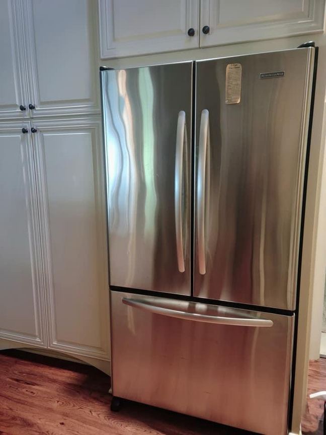Stainless steel refrigerator sanitized inside and out