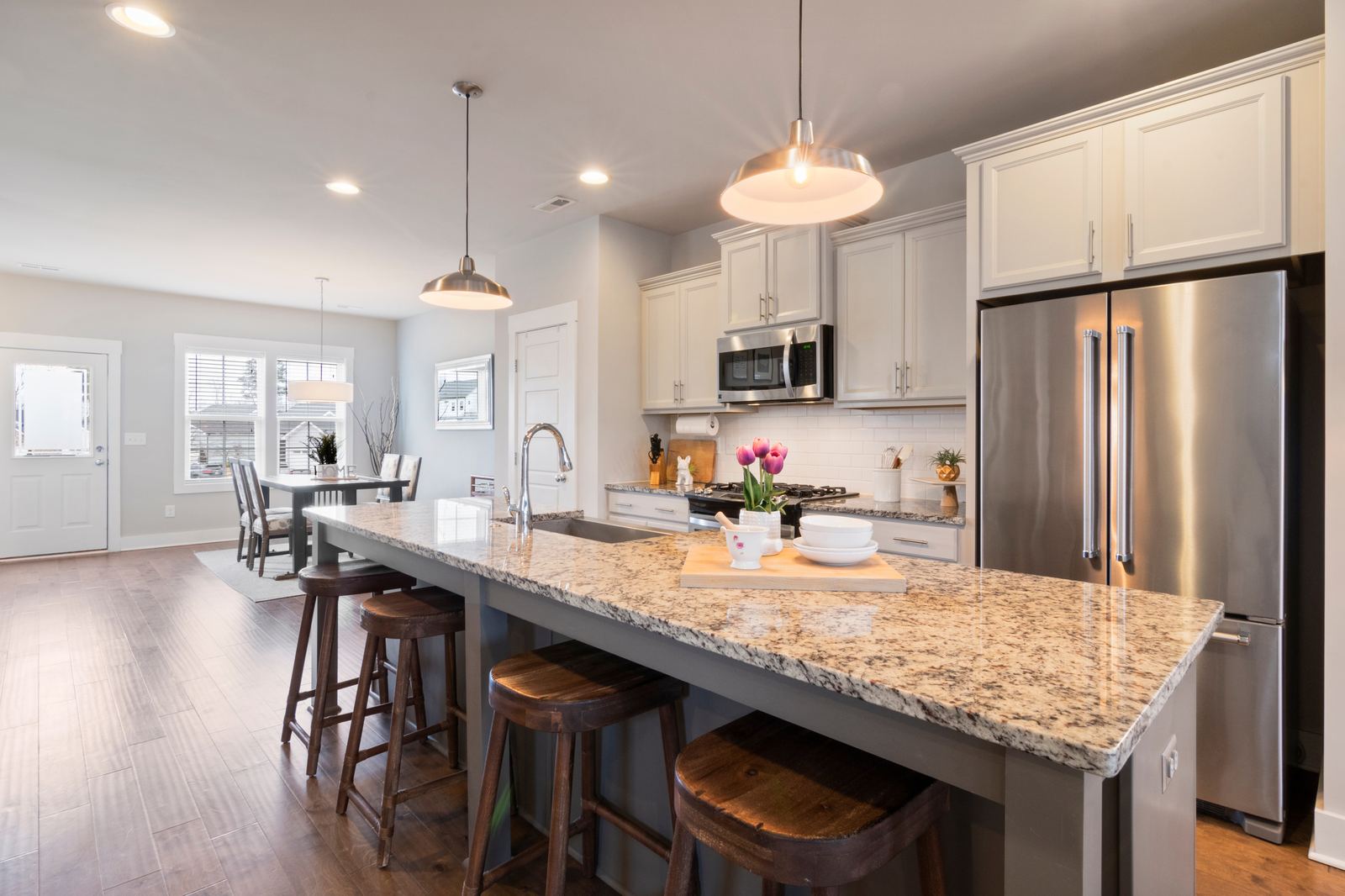 Bright, spotless kitchen after a professional cleaning by Greysy Cleaning Services