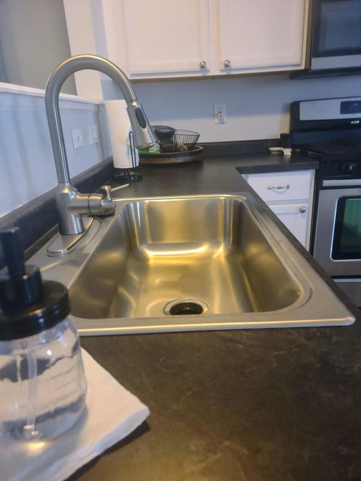 Stainless steel sink polished to a shine