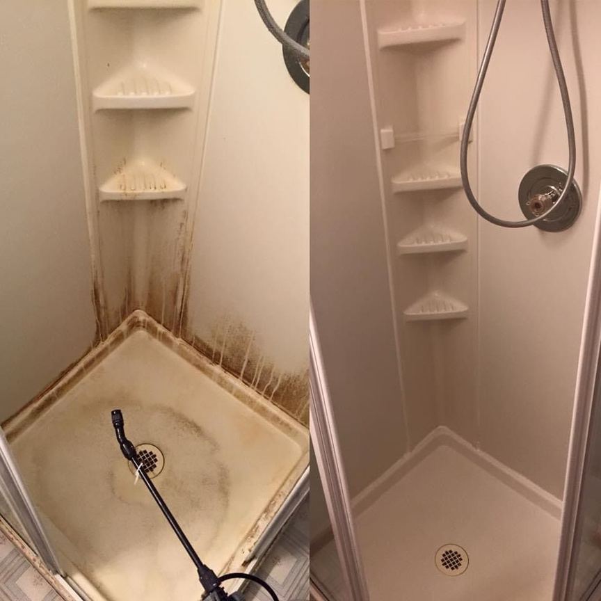 Shower stall covered in grime before cleaning